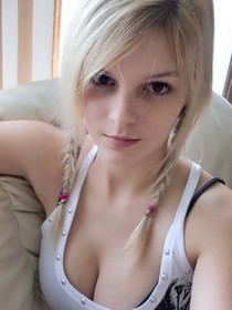 Cute teen Mi holds a